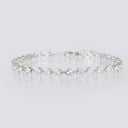High Quality Round Bezel CZ Bracelet with Extender displayed in circle.