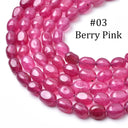 A close-up of curved, faceted oval beads in a translucent berry pink color, with the text '#03 Berry Pink' overlaid on the top right against a white background.