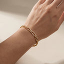 High Quality Fine‑Cut CZ Link Bracelet displayed on a woman's hand.