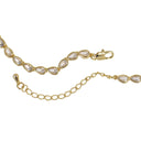 Gold tennis bracelet with marquise-cut clear crystals, featuring a lobster clasp, extender chain, and adjustable links on a white background.