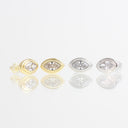 Four marquise-cut stud earrings displayed in a row on a reflective white surface, shown in yellow gold, silver, and two-tone gold/silver finishes with clear gemstones.