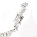 A close-up of a tennis bracelet featuring clear rectangular and marquise-cut gemstones in a silver-toned setting, shown against a bright white background.