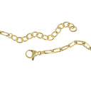 A close-up of a gold chain necklace with alternating oval and elongated links, featuring a lobster clasp on one end, set against a plain white background.