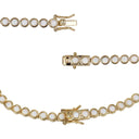 A gold tennis bracelet featuring round white mother-of-pearl or opal-like inlays, shown in three close-up views against a plain white background.