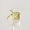 A pair of gold geometric cufflinks featuring a square concentric-rail design and a smaller triangular accent, displayed on a reflective white surface.