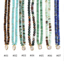 Seven beaded necklaces in different stone colors are shown side by side on a white background, each with a gold pendant. The necklaces are labeled #01 through #07, and the stones include brown, turquoise, green, and blue varieties.