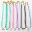Seven fabric wrist straps in different colors are displayed side by side on a white background, each with gold-tone hardware and a numeric label below (#08 to #14). The straps include mint green, aqua, light pink, medium pink, lavender, taupe, and light blue-gray, with a subtle diagonal woven pattern.