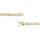 A close-up of a gold tennis bracelet showing its round bead links and spring-ring clasp mechanism on a solid white background.