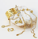 stainless steel jewelry collections showing on a white stone